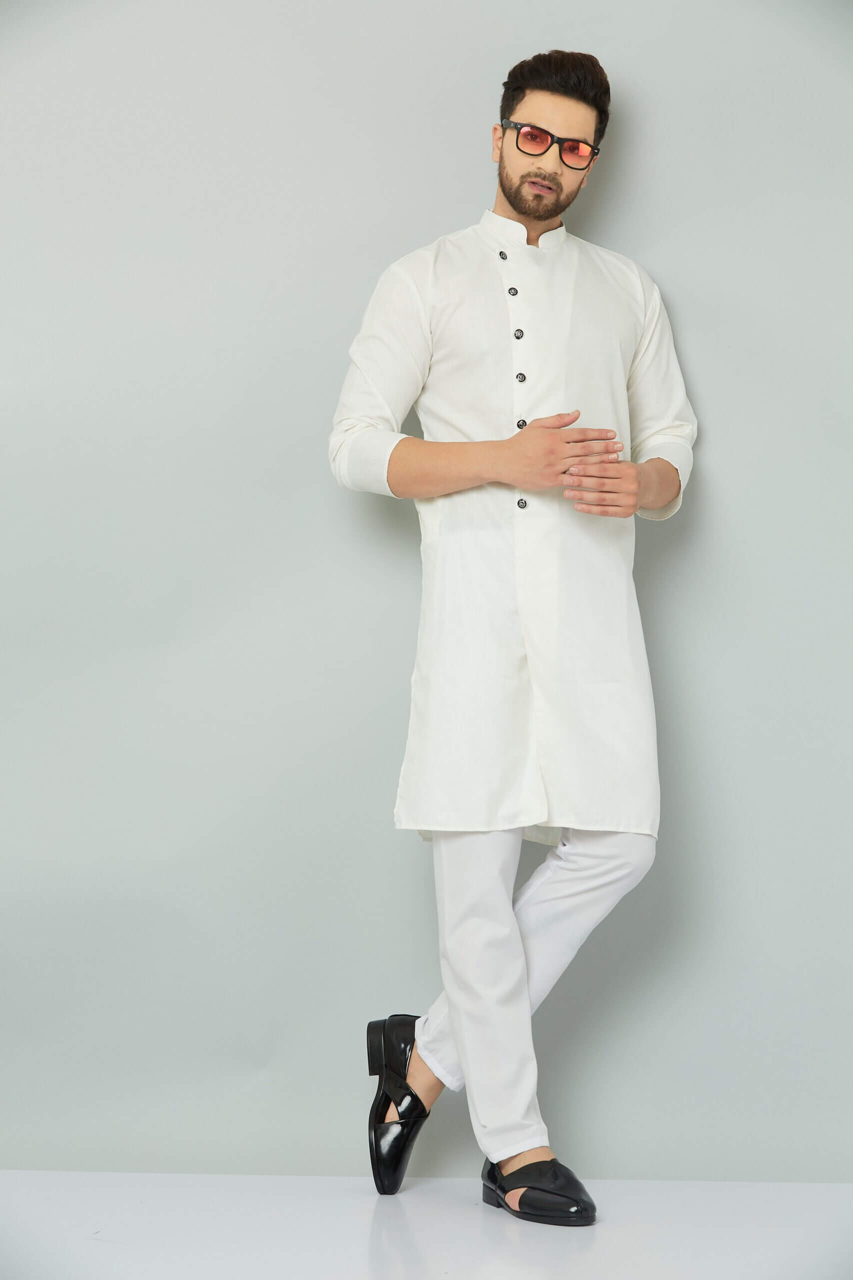 Traditional Indian kurta with intricate embroidery and vibrant colors.