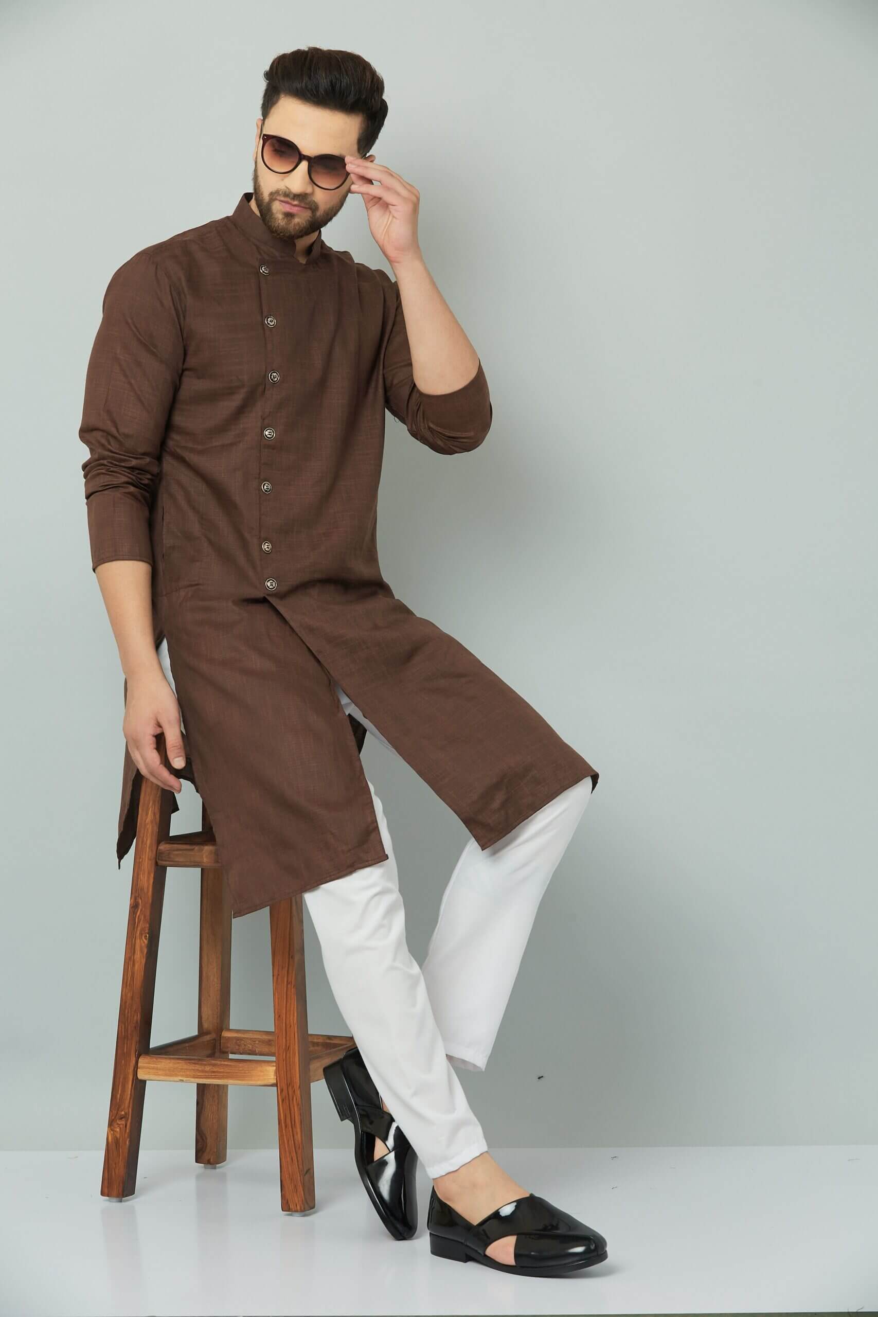 Vibrant Indian kurta set made of yellow cotton fabric.